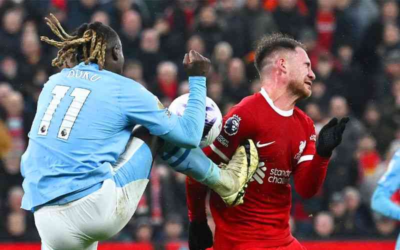Arsenal remain top as Man City and Liverpool draw at Anfield