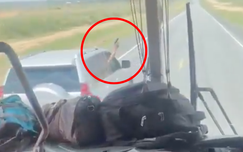 VIDEO: Armed motorist brandishes gun, dares bus driver in shocking road rage