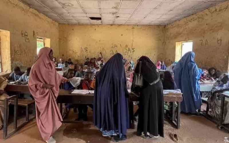 Nigeria searches for abducted schoolgirls as gunmen attack church