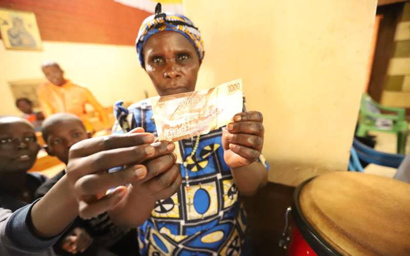 Images of money-weighing men indicate moral rot, not progress