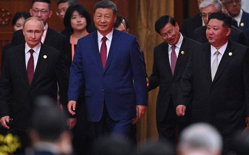 China 'unstoppable', says Xi with Kim, Putin at his side