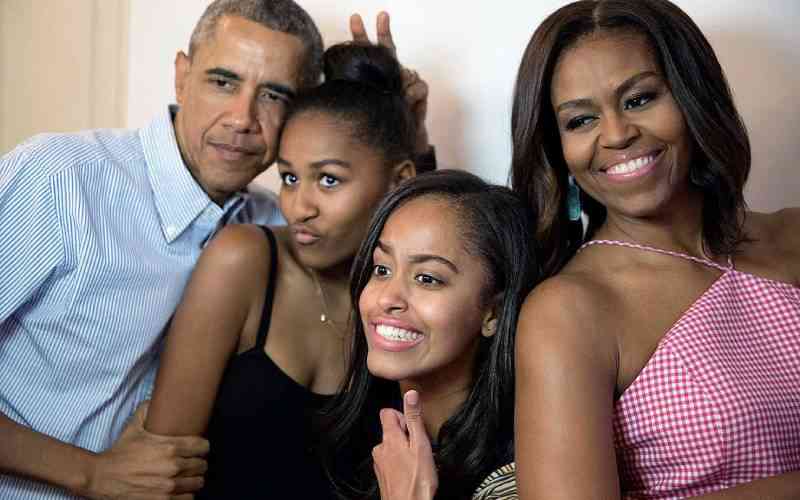 Michelle Obama reveals struggle to keep daughters' teen years private