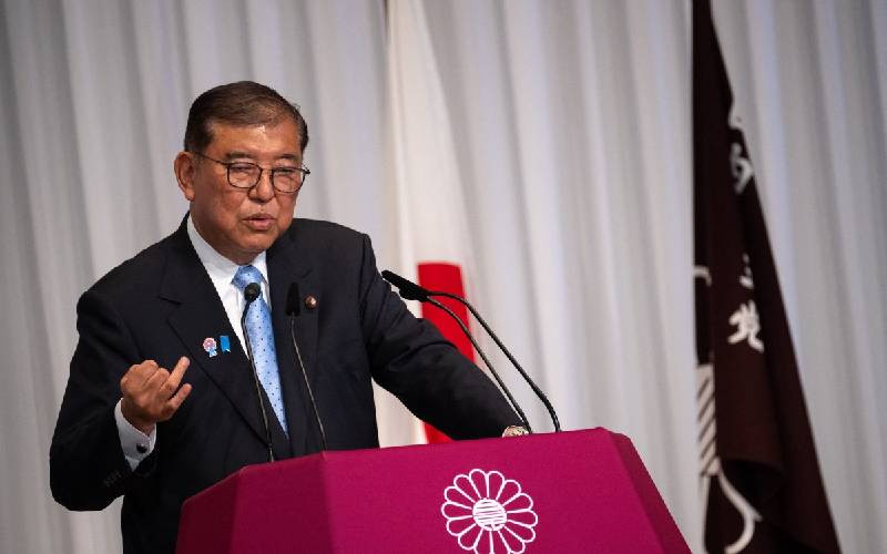 Japan PM hangs on after 'extremely regrettable' election.