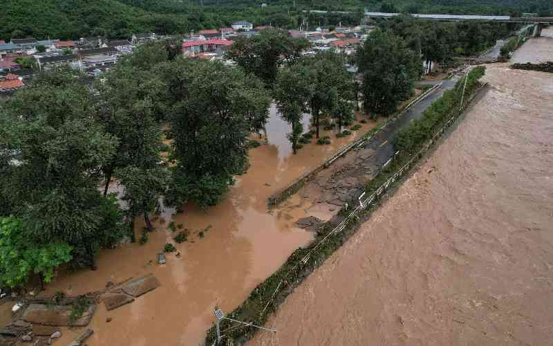 Four dead, eight missing in China landslide after heavy rain