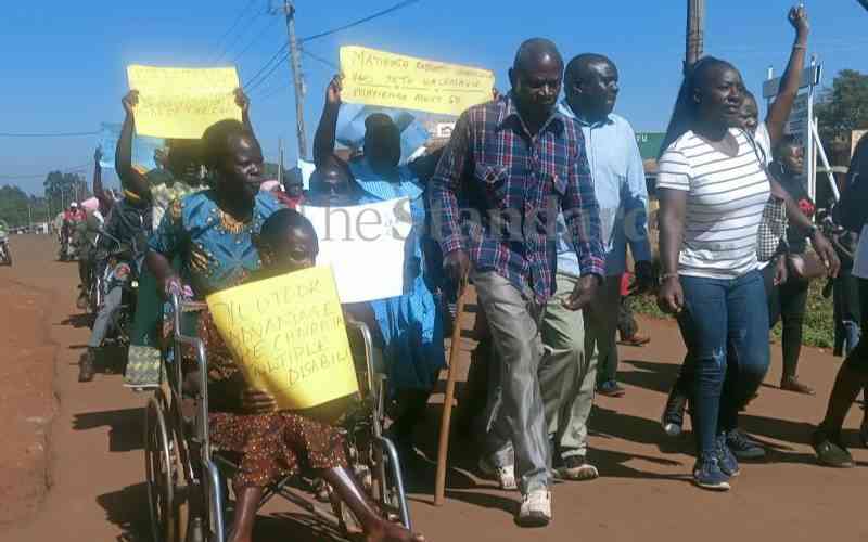 Protesters demand sacking of man in 'disabled' position