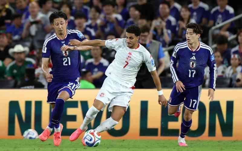 Japan stroll to victory over Tunisia in World Cup's 1,000th game