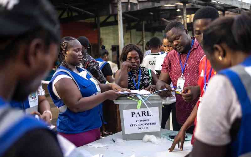 Ghana counts votes in tight presidential race, hopes for better times