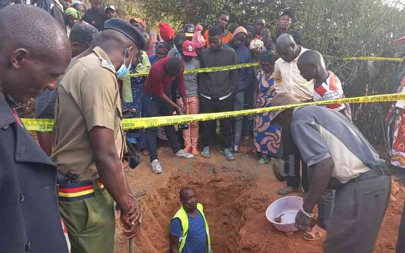 Two arrested after police dig up body in shallow latrine