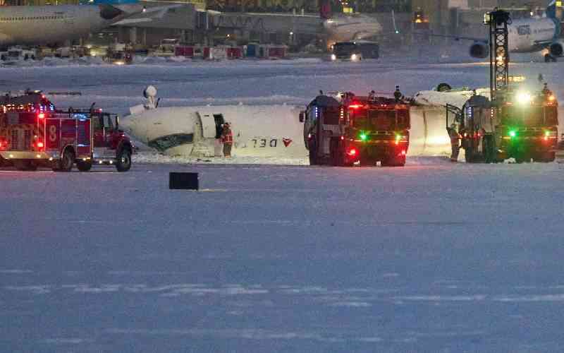 Delta passengers dangled from seats as plane flipped over