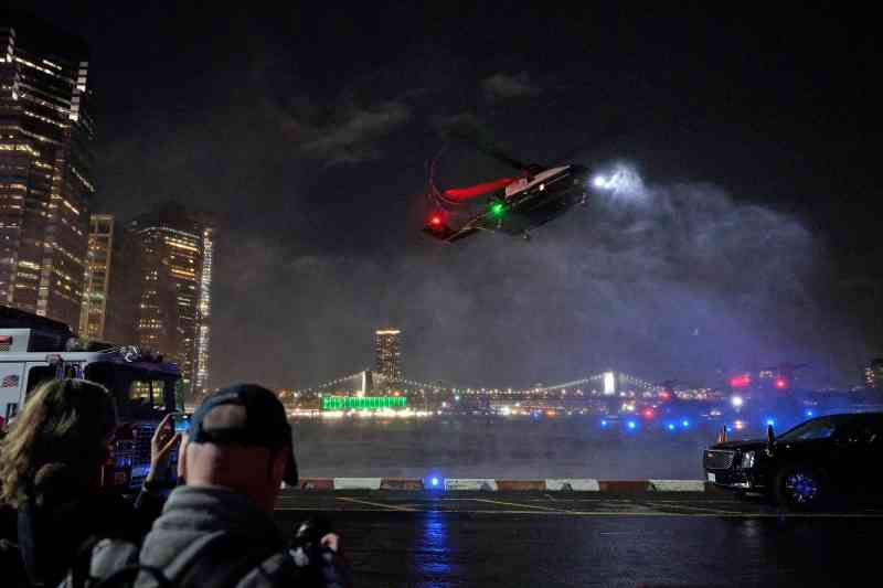 Man charged with shining laser pointer at Trump helicopter