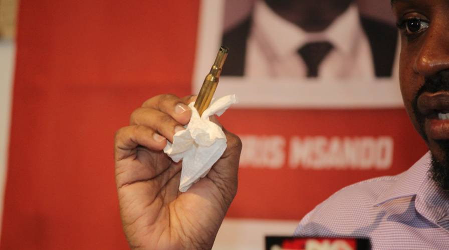 Boniface Mwangi claims bullet was planted in his luggage