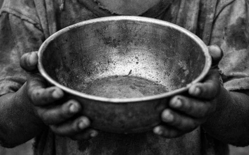 Concern as viral video shows children queuing for food in heavy rain