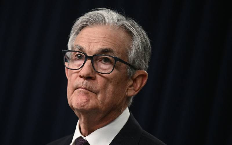 Trump calls US Fed chair 'fool' after pause in rate cuts