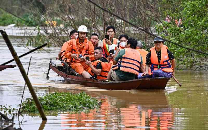 Vietnam evacuates 59,000 as typhoon floods toll climbs to 127