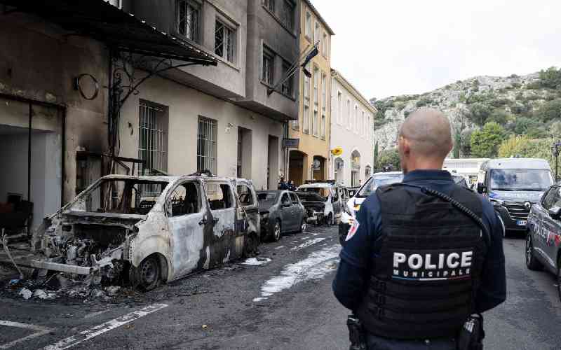 France vows to step up drugs fight after police vehicles torched