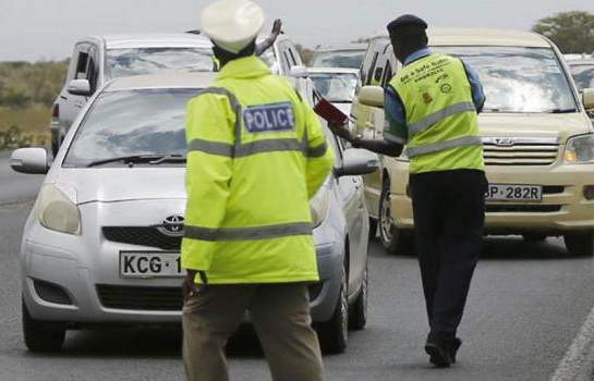 Motorists protest traffic cops hitching free rides