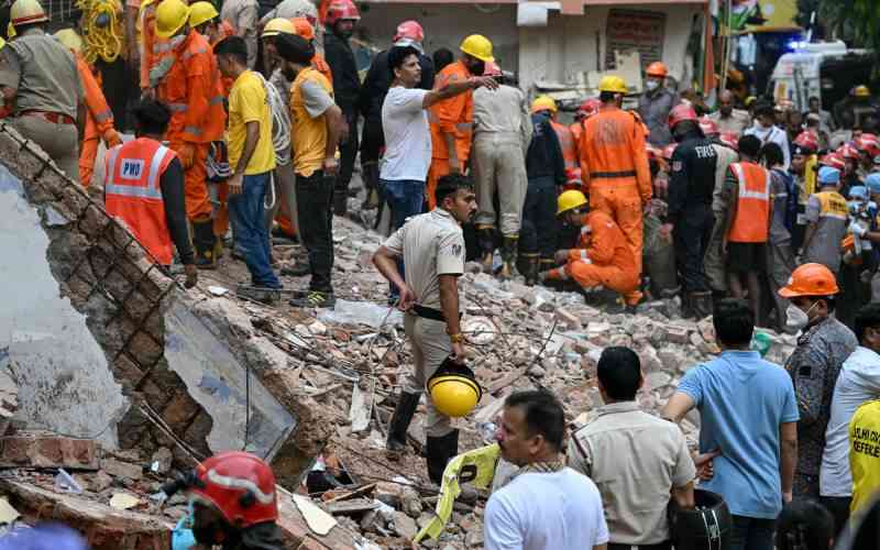 Three killed, others trapped in India building collapse