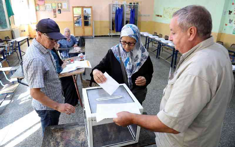 Algerians vote for new parliament, turnout projects record low