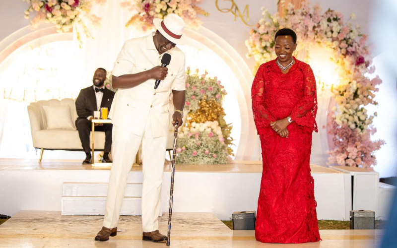 Ruto dazzles in all white Kaunda suit, matching fedora hat at Mudavadi's son's wedding