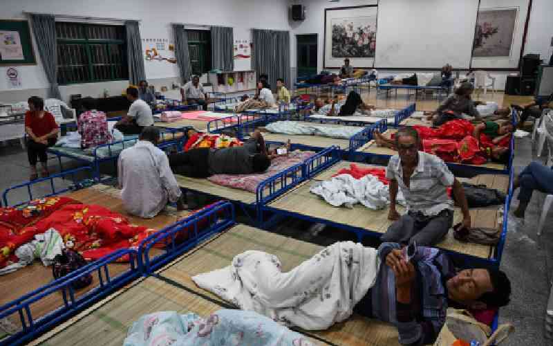 Shanghai evacuates 283,000 people as typhoon hits