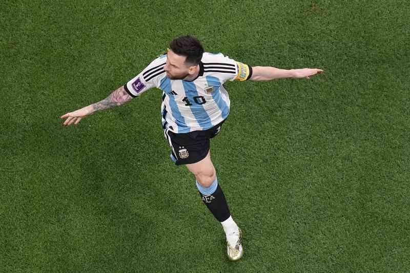 Messi scored as Argentina laboured to beat Australia 2-1 to set up a quarters date with Netherlands