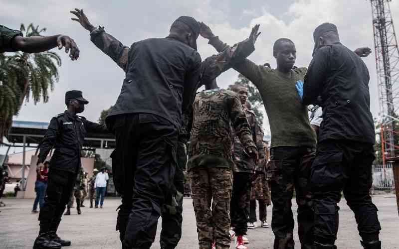 DR Congo says handover of 20 alleged Hutu rebels was staged