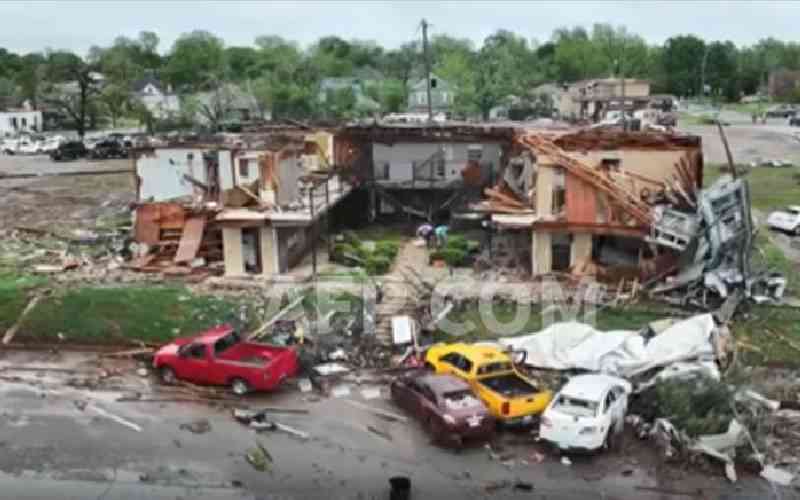 At least five killed as dozens of tornadoes plow central US
