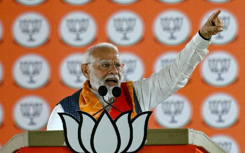 India's Modi eyes election victory, top opponent back behind bars
