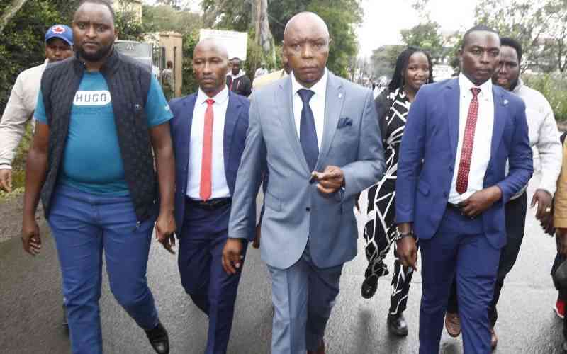 Maina Njenga's supporters follow proceedings on screens as trial enters day three