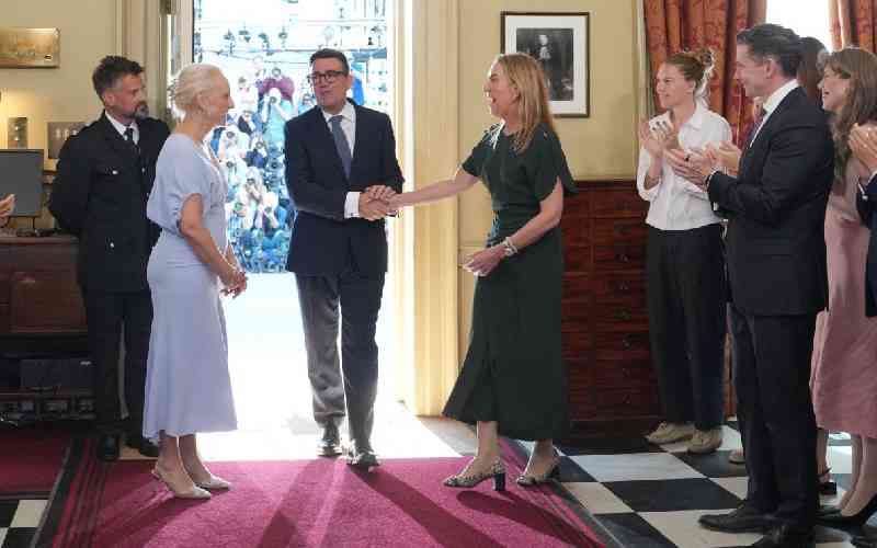 New UK PM Burnham stamps authority with cabinet shakeup