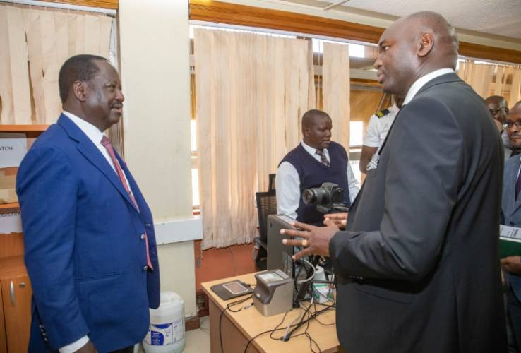 Raila visits immigration department, renews passport and praises staff