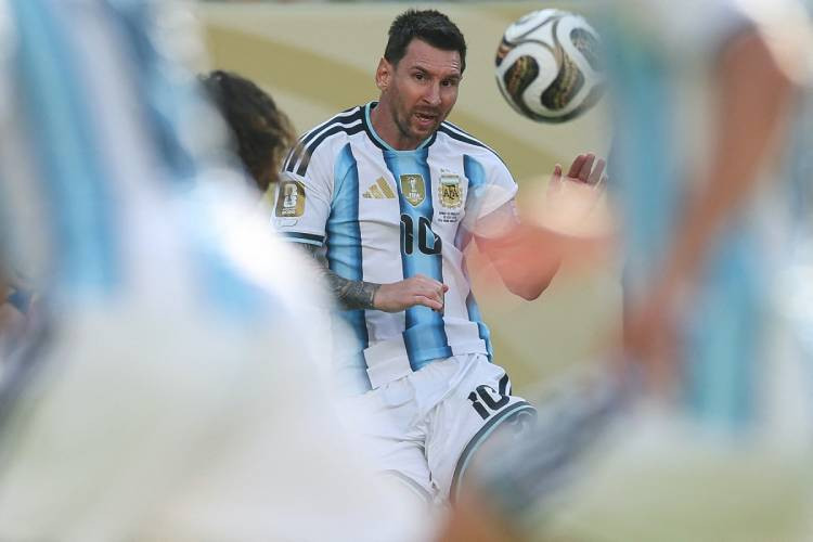 Messi says not certain to play "much longer" after father's death