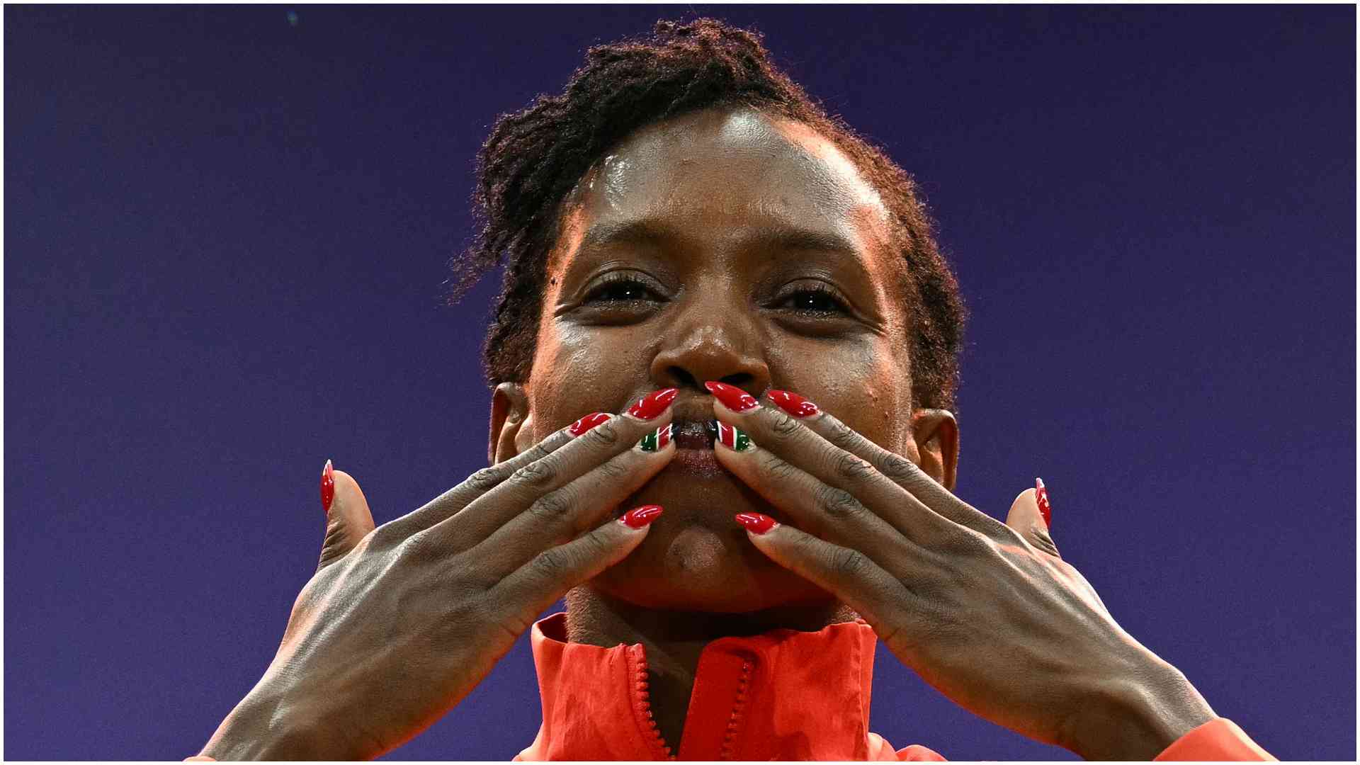 Faith Kipyegon's Kenyan flag nails steal spotlight as she wins historic fourth world title