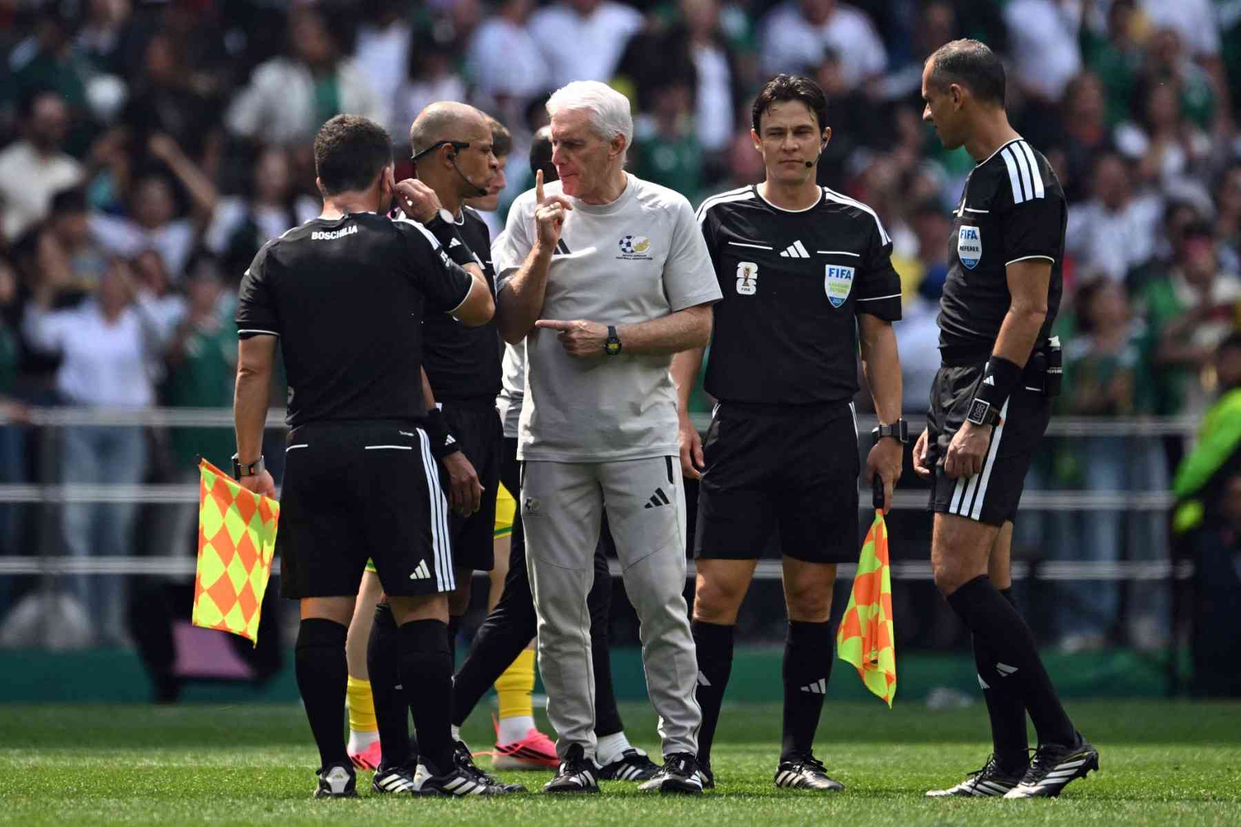 South Africa's Broos takes aim at World Cup covered stadia, drinks breaks