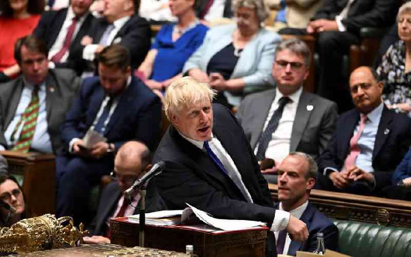 Boris Johnson digs in as ministers, lawmakers desert UK government