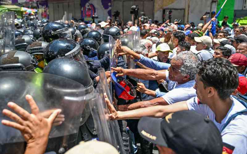Venezuela police tear-gas protesters demanding salary rises