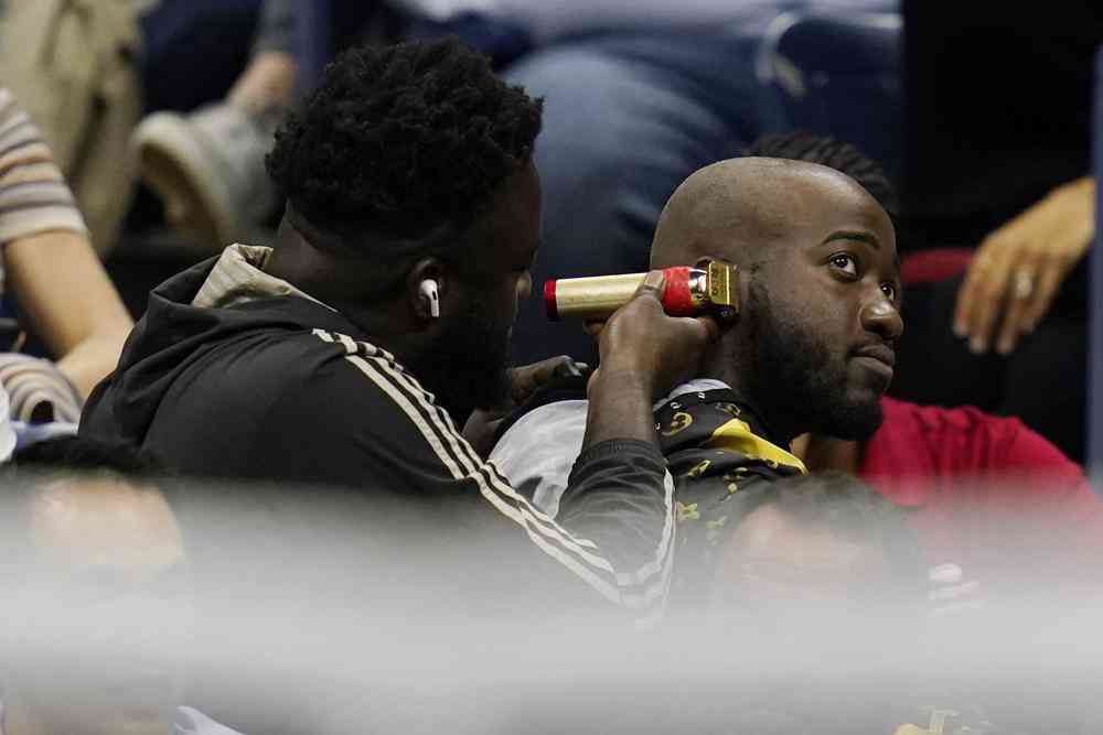 Hairy situation at US Open: two removed for haircut in stands