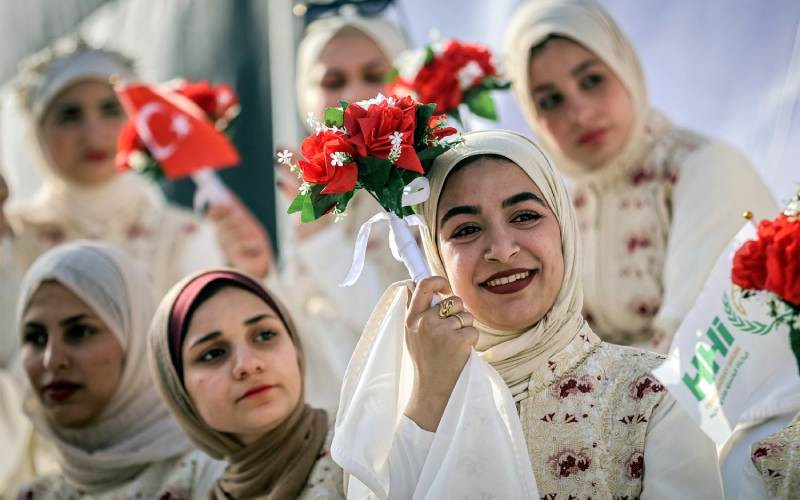 'Happiest day of our lives': Gazans hold mass wedding among ruins