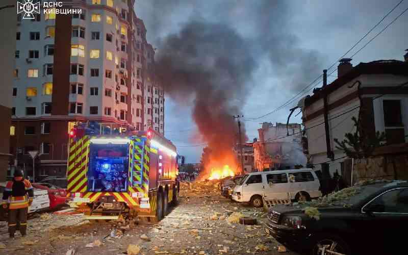 Russian missile and drone barrage kills four in Kyiv