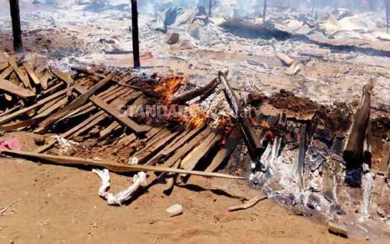 Traders count losses after inferno razes business premises