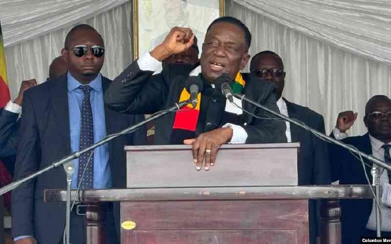 Zimbabwe president signs death...