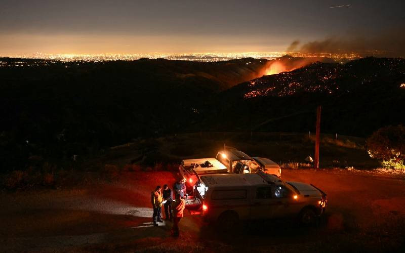 Firefighters race to beat LA blazes as winds grow and death toll hits 16