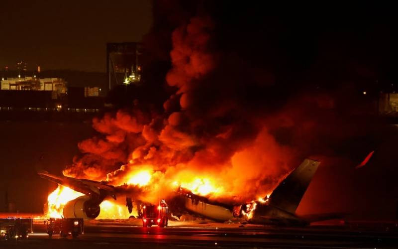 Planes collide at airport in Japan, jetliner burns