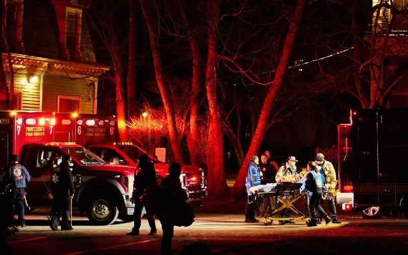 Police hunt gunman who killed two at US university