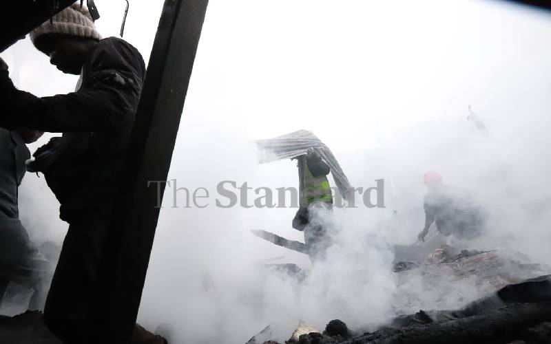 Salvage crews at Gikomba