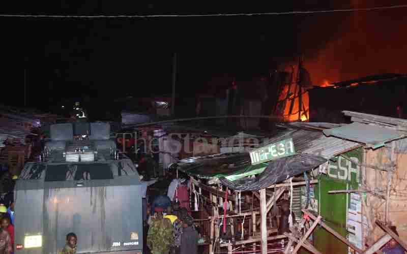 Fire engine in action during the dawn inferno