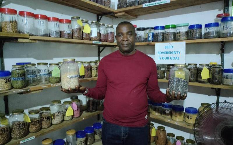 Samuel Nderitu, Executive Director of Grow Intensive Agriculture Centre, Kenya (G-BIACK) inside his genebank that saves various indigenous seeds located in Muguga, Kiambu County. (Nanjinia Wamuswa, Standard)