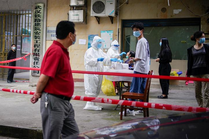 China's public health reforms may not prevent next virus: experts