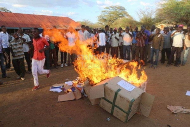 Irate residents disrupt voting, burn ballot papers