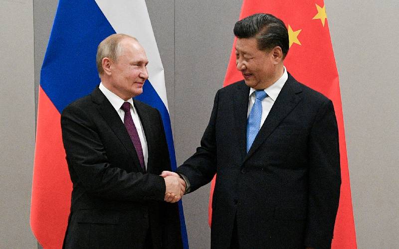 Russian sanctions over Ukraine grow, Biden to talk to Xi